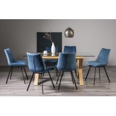 Turin Clear Tempered Glass 6 Seater Dining Table with Light Oak Legs & 6 Fontana Blue Velvet Fabric Chairs with Grey Hand Brushing on Black Powder Coated Legs