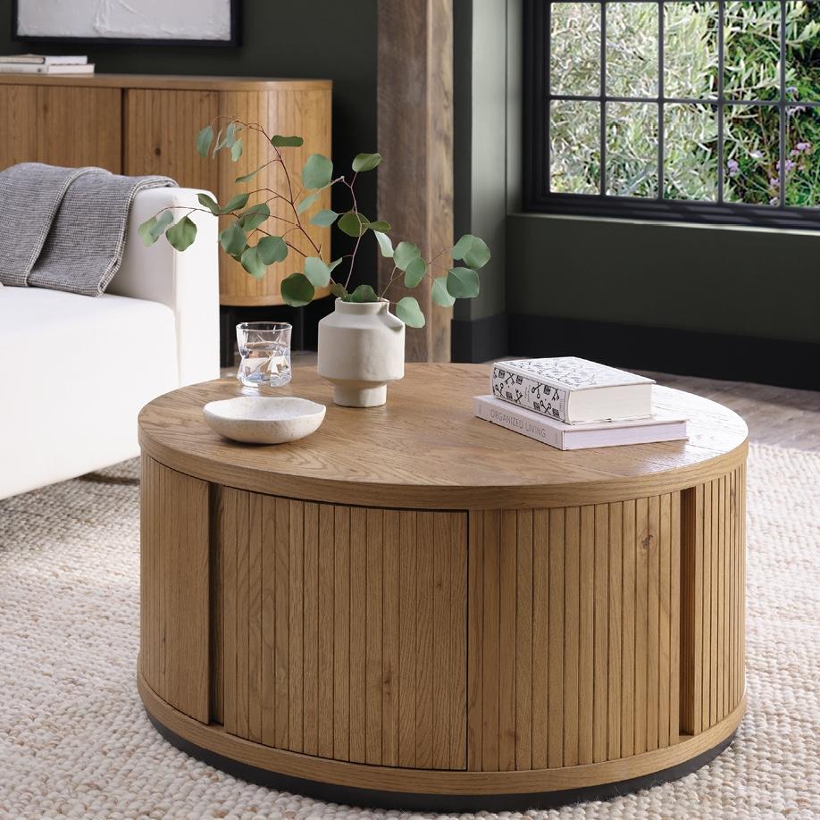 Round, grounded, and easy to live with. ⁠ ⁠ The Vega Rustic Oak drum coffee table holds its own i...