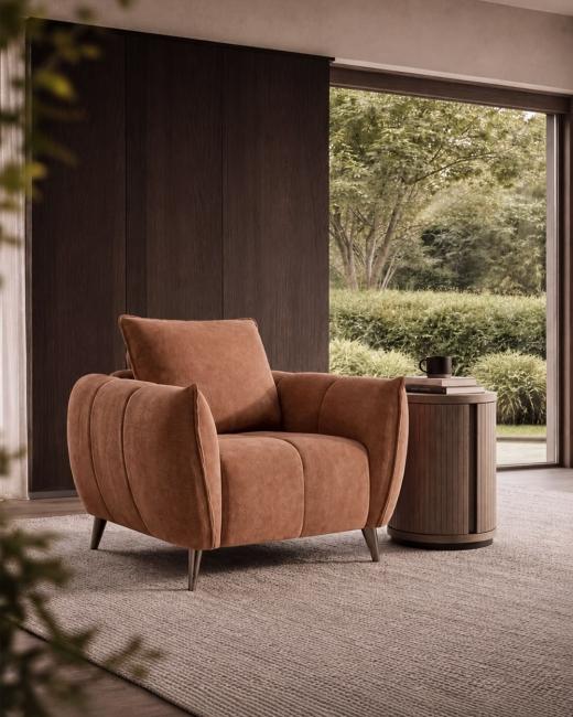 The Elara Armchair in Terracotta brings warm colour and contemporary comfort to modern interiors. Wit...
