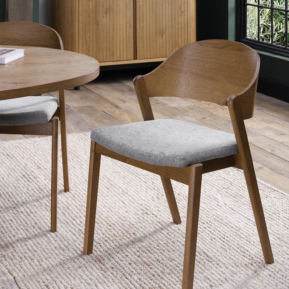 The shape says design, the seat says stay a while. ⁠ ⁠ The Vega Rustic Oak ply-back chair is a mo...