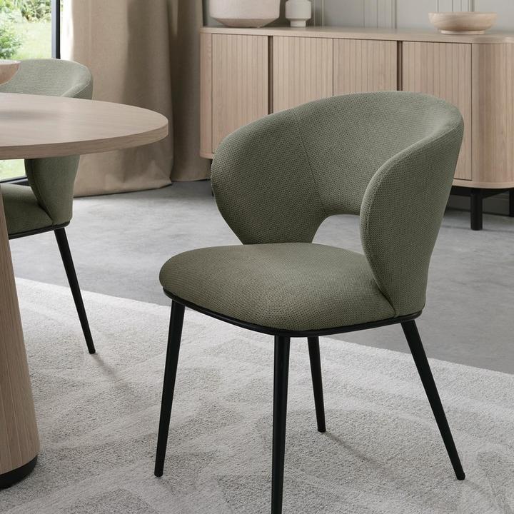 💚 A pop of nature-inspired color. 💚⁠ ⁠ The Luca chair in green fabric is bringing fresh, ea...